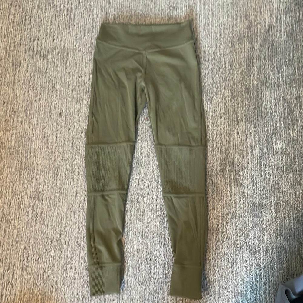 Green leggings